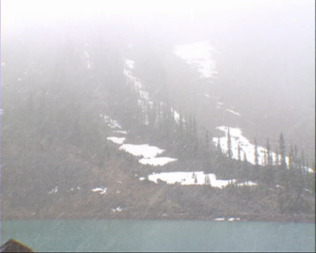 下雪雪中高山青松小湖视频背景素材 下雪雪中高山青松小湖视频背景素材