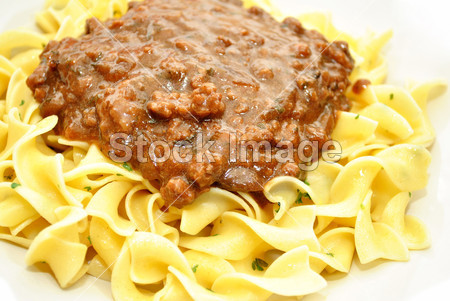 Ground Beef in Brown Gravy Over Pasta Noodl