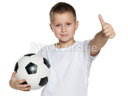 Smiling boy with soccer ball图片素材(图片编号