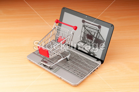互联网在线购物概念与计算机和购物车图片素材
