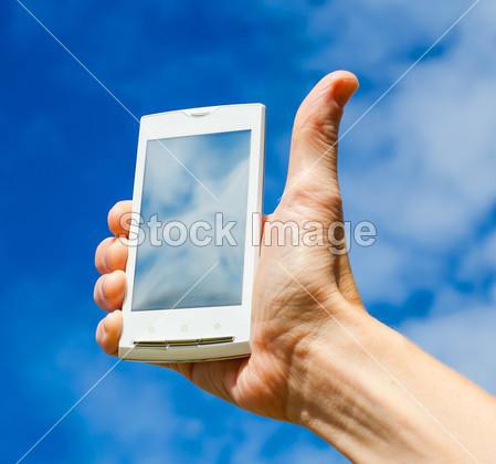 手机在手上的天空背景图片素材(图片编号:506