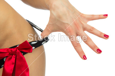 脱掉她的性感内衣内裤或丁字裤的女人图片素材