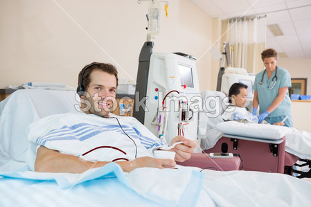 Patient Holding Glass Of Crushed Ice During R