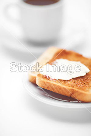 配上白色隔离黄油面包和茶图片素材(图片编号