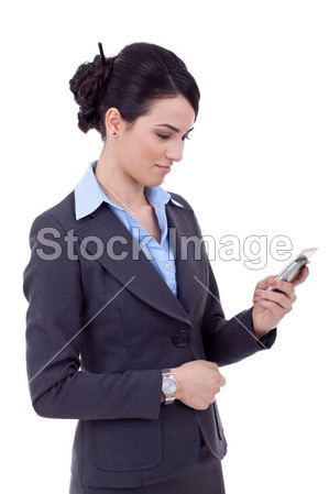 在电话上女人发短信的业务图片素材(图片编号