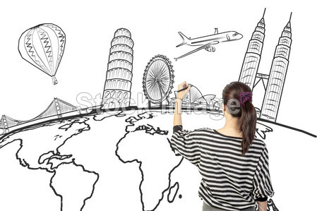 亚洲女人绘画或书写梦想环游世界图片素材(图